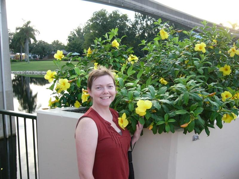 Annie and flowers.JPG